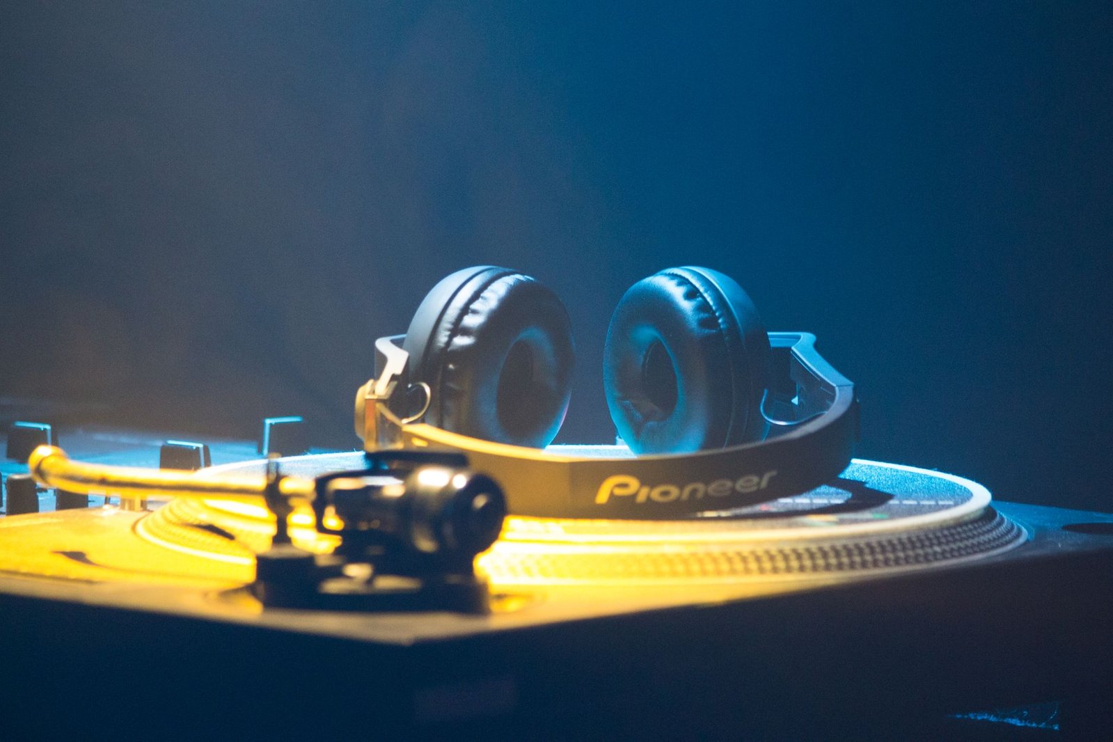 DJ mixer and controller setup representing the gear a working dj budgets a music subscription around