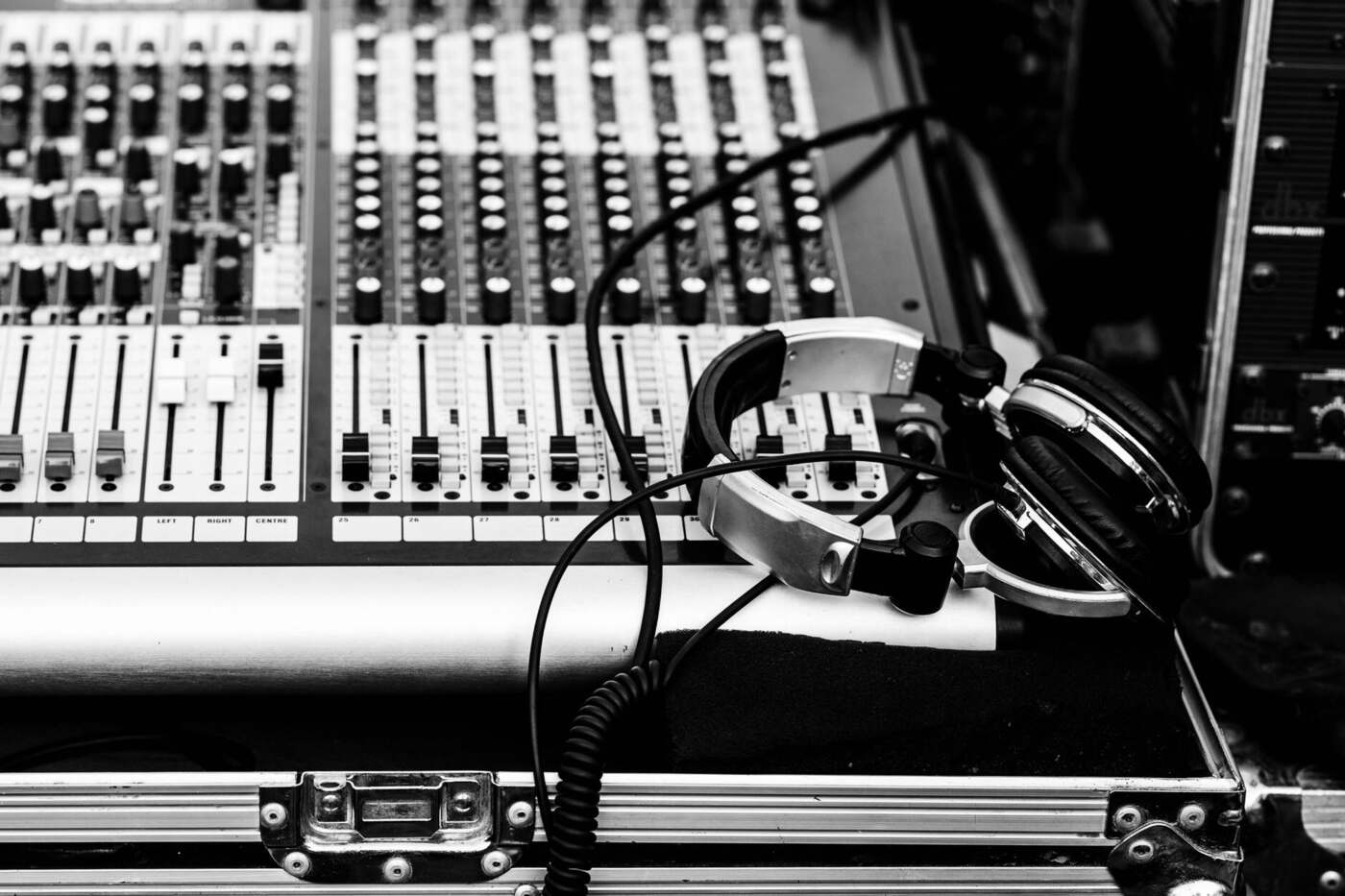 Close-up of a DJ mixer and headphones ready for a set