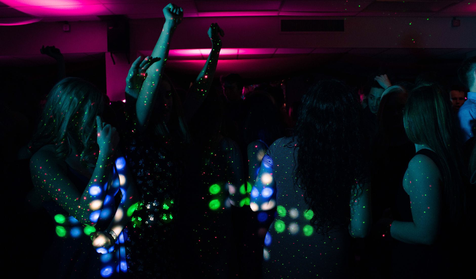 Open format DJ performing for a mixed crowd at a wedding reception